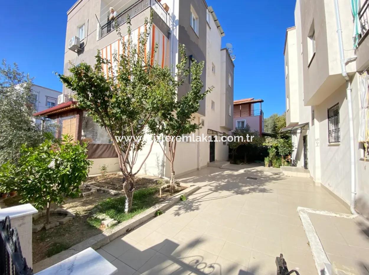 2 1 Apartment With Ground Floor Garden For Sale In Seferihisar Ürkmez Center